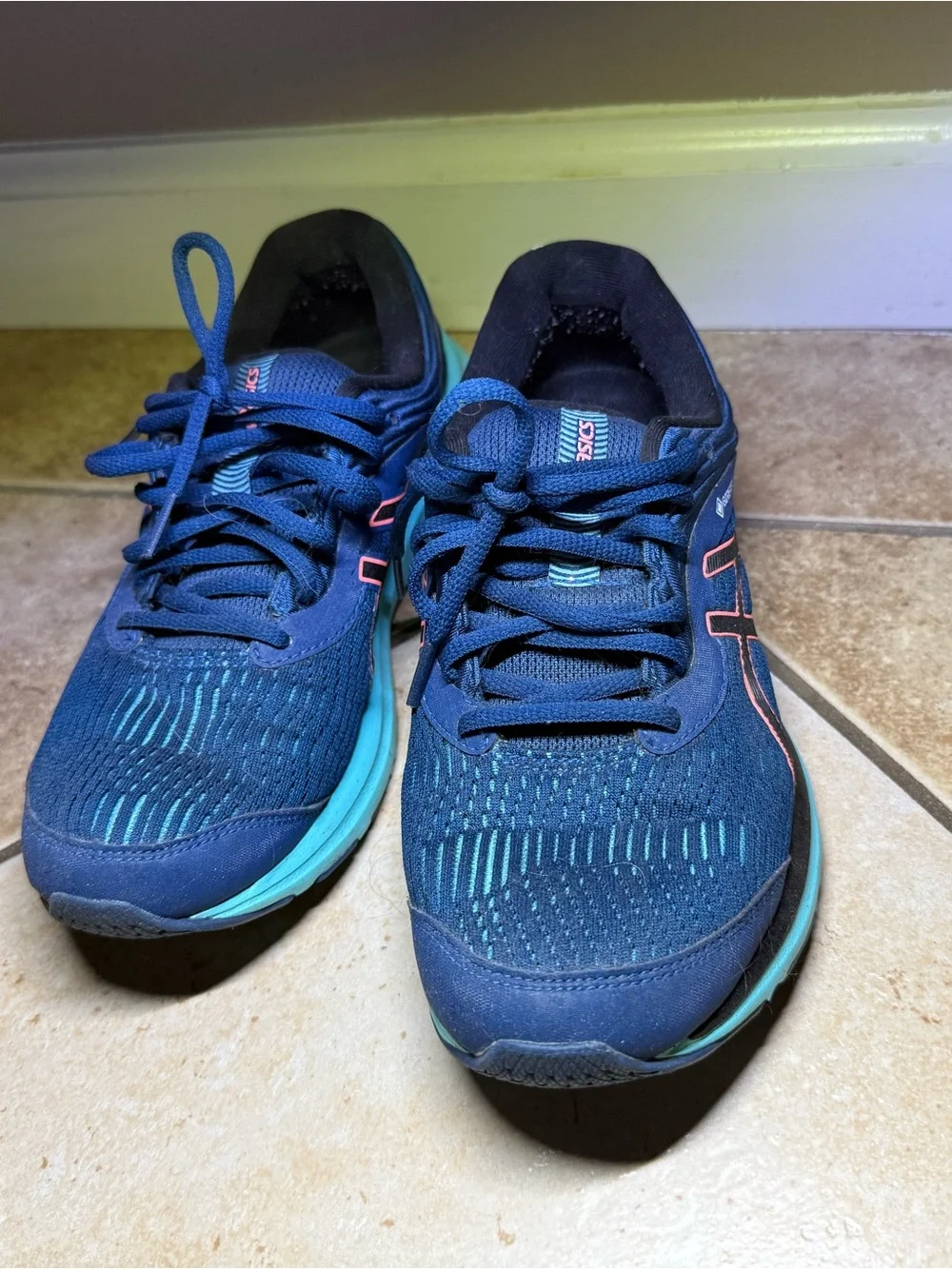 Asics Navy Running Shoes with Teal Soles and Coral Accents